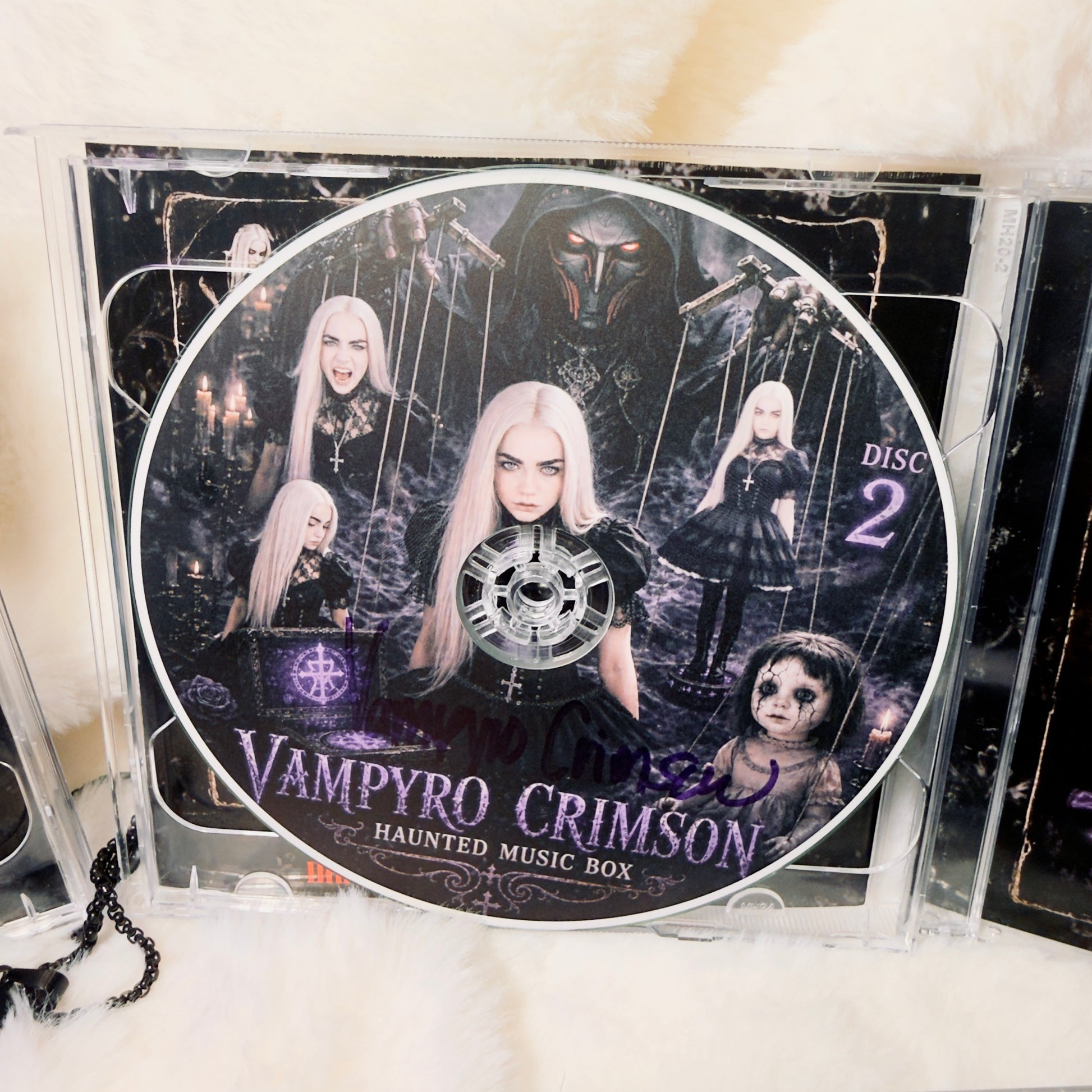 SIGNED CD + Exclusive Puppeteer Haunted Music Box Band Shirt